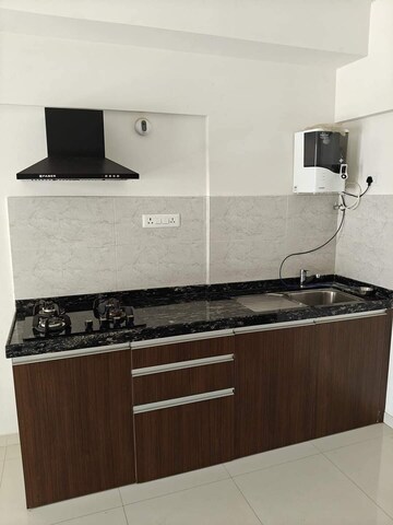 Kitchen in Studio Apartment at Gera World of Joy, Kharadi – for Rent