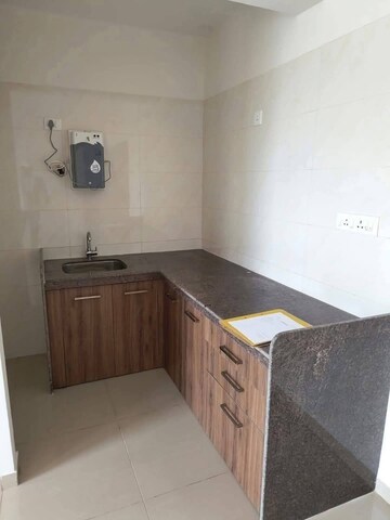 Kitchen in 1 BHK Apartment at Duville Riverdale Suites, Kharadi – for Rent