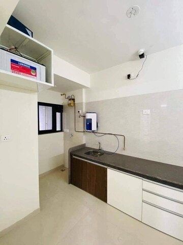 Kitchen in 2 BHK Apartment at Duville Riverdale Heights, Kharadi – for Rent