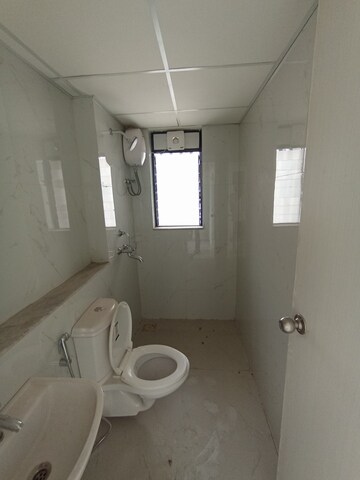 Bathroom in 3 BHK Apartment at Runwal Gardens Phase 2, Dombivli East – for Rent
