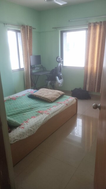 Bedroom in 2 BHK Apartment at Gera Emerald City, Kharadi – for Rent
