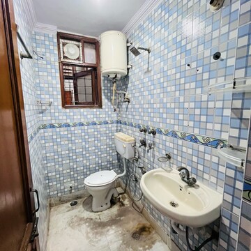 Bathroom in 2 BHK Builder Floor at Khirki Extension – for Rent