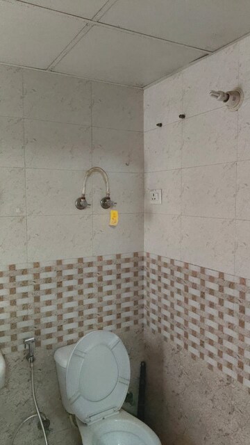 Bathroom in 2 BHK Apartment at Saviour Green Arch, Tech Zone 4 Greater Noida – for Rent