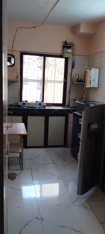 Kitchen in 2 BHK Apartment at Poonam Jewel, Poonam Nagar – for Rent