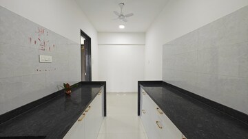 Kitchen in 1 BHK Apartment at Sheth Midori, Dahisar East – for Sale