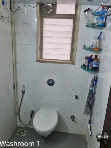 Bathroom in 2 BHK Apartment at Mahadev Heights, Malad West – for Rent
