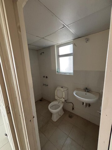 Bathroom in 2 BHK Apartment at Wave Dream Homes, Wave City – for Rent