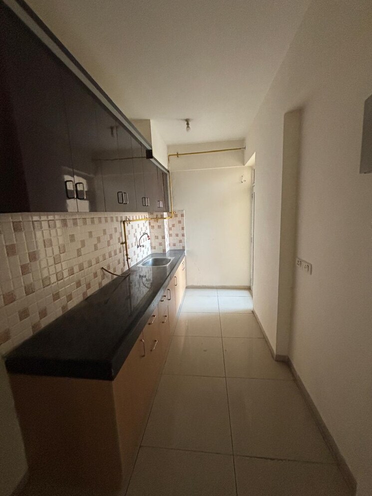 Kitchen, wave-dream-homes 2 Bedroom 808 Sq.Ft. Apartment In Wave City Ghaziabad 8921349
