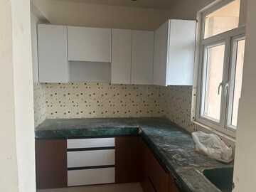 Kitchen in 2 BHK Apartment at ROF Aalayas, Sector 102 – for Rent