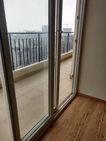 Balcony in 3 BHK Apartment at Amrapali Crystal Homes, Sector 76 – for Rent
