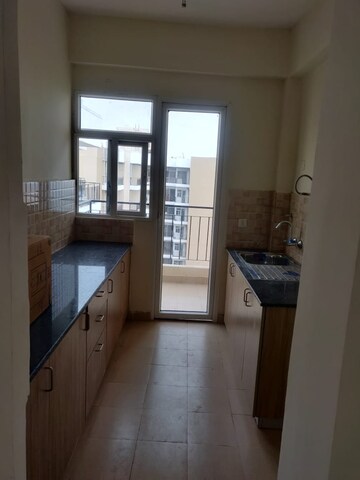 Kitchen in 3 BHK Apartment at Amrapali Crystal Homes, Sector 76 – for Rent
