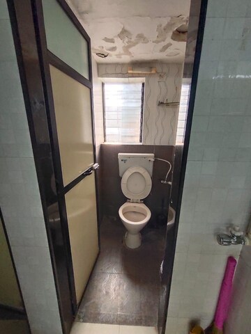 Bathroom in 1 BHK Apartment at Gomantashram Apartment, Vile Parle East – for Rent