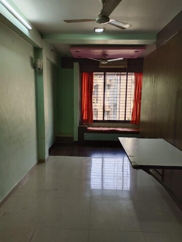 Living Room in 1 BHK Apartment at Gomantashram Apartment, Vile Parle East – for Rent