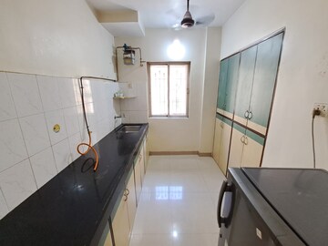 Kitchen in 1 BHK Apartment at Shubharambh Complex, Manpada – for Rent