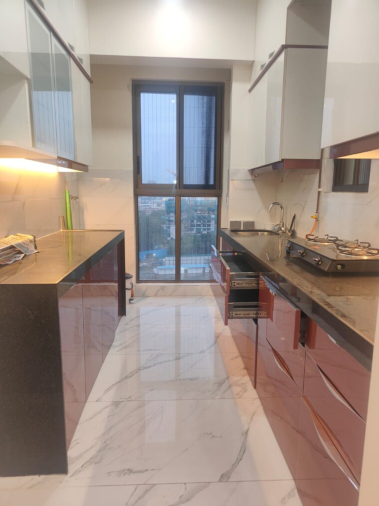Kitchen, raymond-ten-x-habitat 2 Bedroom 800 Sq.Ft. Apartment In Pokhran Road No Two Thane 8921554