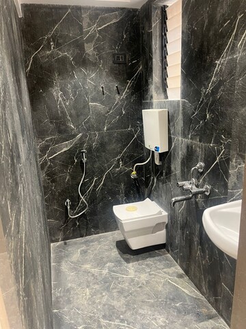 Bathroom in 1 BHK Apartment at Raj Tulsi Aawas, Badlapur East – for Sale
