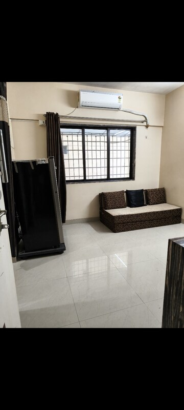 Living Room in 1 BHK Apartment at Sai Milan CHS, Worli – for Rent