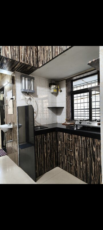 Kitchen in 1 BHK Apartment at Sai Milan CHS, Worli – for Rent