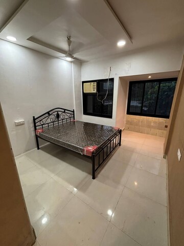 Living Room in 2 BHK Apartment at Amita CHS Andheri West, Andheri West – for Rent