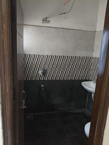 Bathroom in 3 BHK Builder Floor at Guru Nanak Enclave, Dhakoli – for Sale