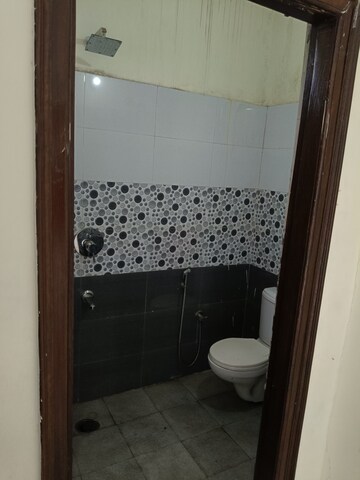 Bathroom in 3 BHK Builder Floor at Guru Nanak Enclave, Dhakoli – for Sale