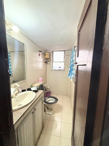 Bathroom in 2 BHK Apartment at Jyoti Tower Andheri West, Andheri West – for Rent