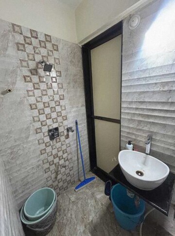 Bathroom in 1 BHK Apartment at Bhoomi Acres, Waghbil – for Rent