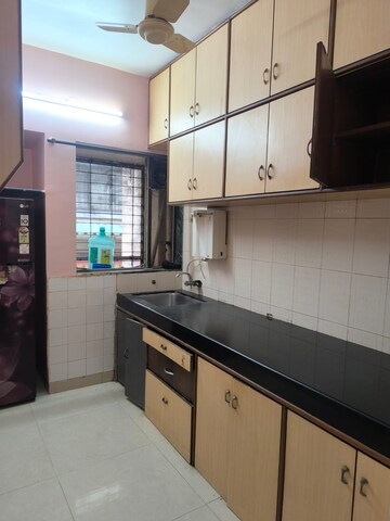 Kitchen in 2 BHK Apartment at New Siddhivinayak CHS, Vashi Sector 14 – for Rent