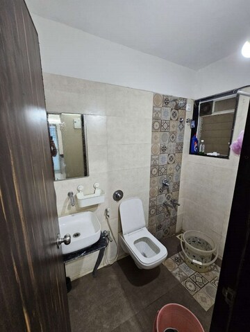 Bathroom in 1 BHK Apartment at Uma Elements, Daighar Gaon – for Rent