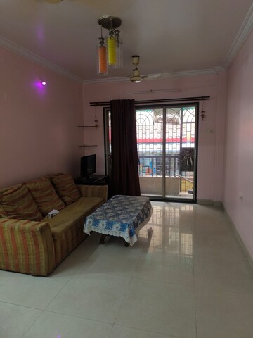 Living Room in 2 BHK Apartment at New Siddhivinayak CHS, Vashi Sector 14 – for Rent