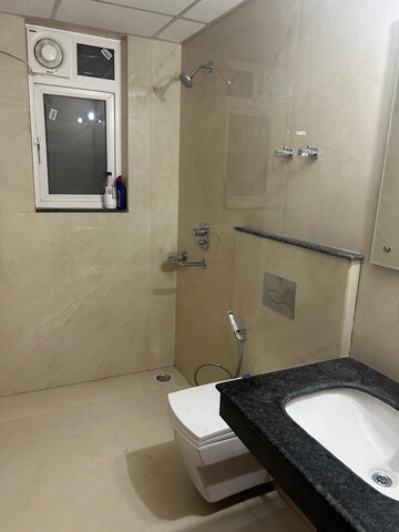 Bathroom in 3 BHK Apartment at Rishita Manhattan, Gomti Nagar – for Rent