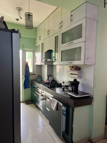Kitchen in 2.5 BHK Apartment at Ajnara Daffodil, Sector 137 – for Rent