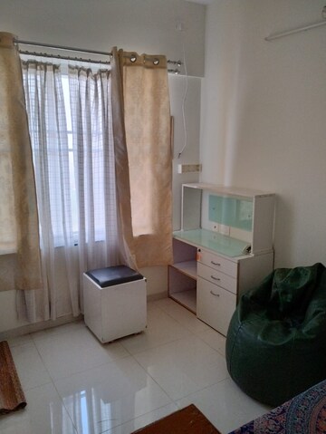 Living Room in 2 BHK Apartment at Kolte Patil R1 Life Republic, Hinjewadi – for Rent