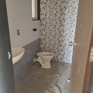 Bathroom in 2 BHK Apartment at Mahavir Kalpavruksha, Ghodbunder Road – for Sale