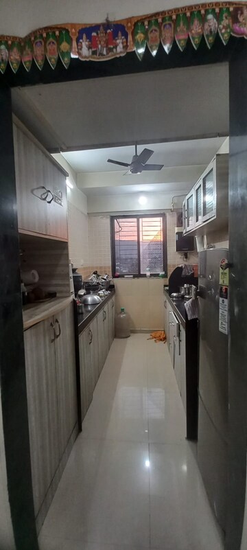 Kitchen in 1 BHK Apartment at Raunak Heights, Ghodbunder Road – for Rent