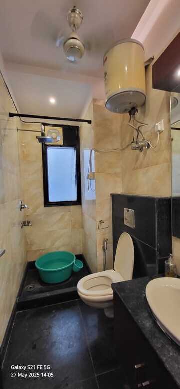Bathroom in 3 BHK Builder Floor at Panchsheel Enclave – for Sale
