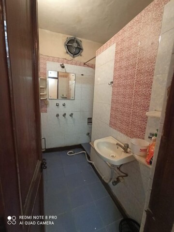 Bathroom in 2 BHK Builder Floor at Kalkaji – for Rent