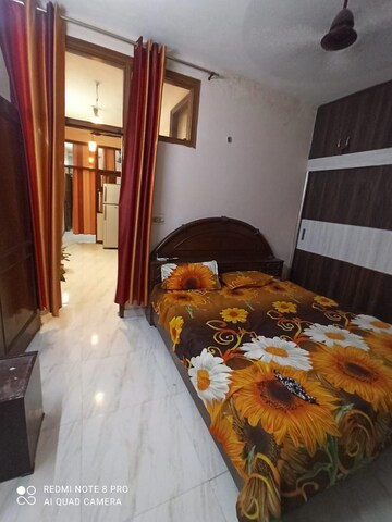 Bedroom in 2 BHK Builder Floor at Kalkaji – for Rent