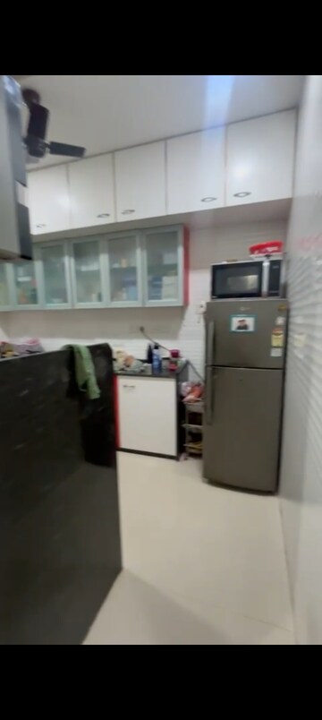 Kitchen in 2 BHK Apartment at Sai Dham CHS Kandivali, Kandivali West – for Rent