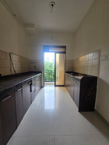 Kitchen in 2 BHK Apartment at Parsik Nagar – for Sale