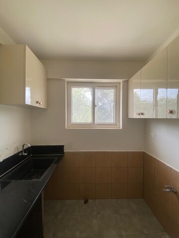Kitchen in 2 BHK Apartment at Brigade El Dorado, Bagaluru – for Rent