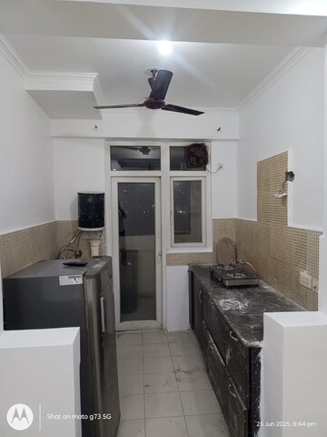 Kitchen in 2 BHK Apartment at Amrapali Silicon City, Sector 76 – for Rent