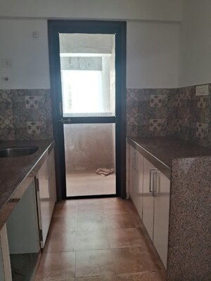 Kitchen in 2 BHK Apartment at Neumec Shreeji Towers, Wadala East – for Sale