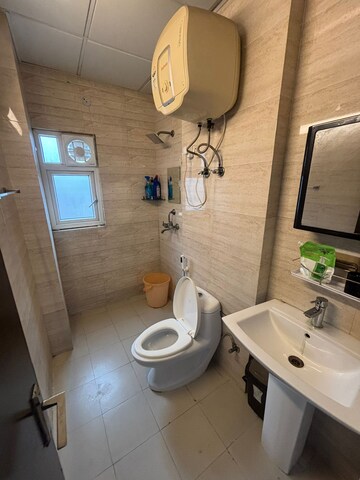 Bathroom in 1 BHK Apartment at Ajnara Daffodil, Sector 137 – for Rent