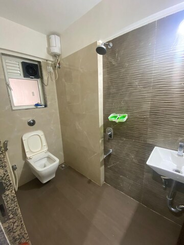 Bathroom in 2 BHK Apartment at Ani Anu Sri Balaji Enclave, Malad West – for Sale