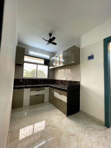 Kitchen in 1 BHK Apartment at Om Sai Sarvamangala Residency, Chouk – for Sale