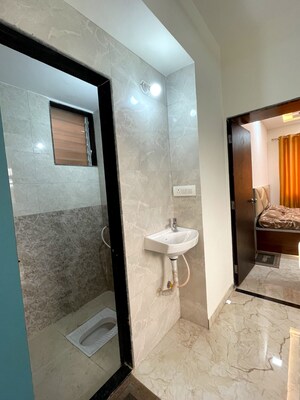 Bathroom in 1 BHK Apartment at Om Sai Sarvamangala Residency, Chouk – for Sale
