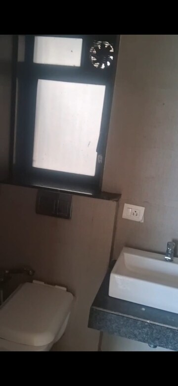 Bathroom in 1 BHK Apartment at Rustomjee Meridian, Kandivali West – for Sale