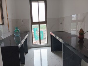 Kitchen in 2 BHK Apartment at Raymond The Address, Pokhran Road No Two – for Sale