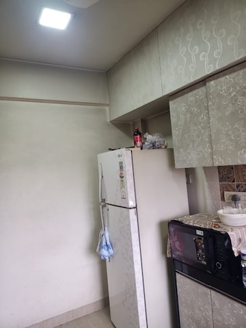 Kitchen in 1 BHK Apartment at Mihar Apartment, Charkop Gaon – for Sale